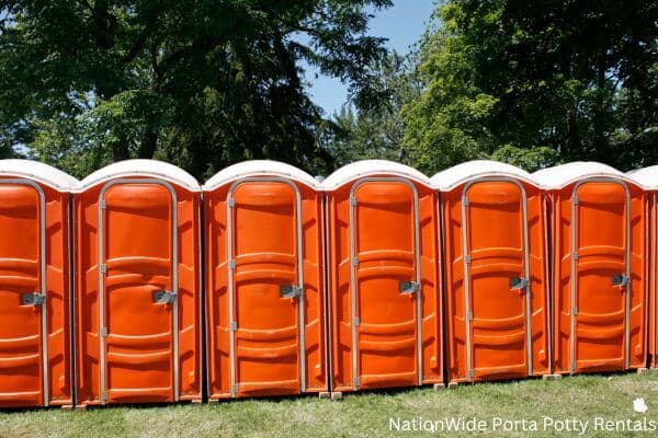 a lineup of clean and well-maintained portable loos for workers in Elliston, VA